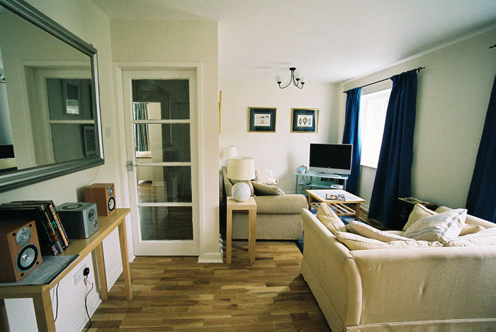 First floor flat — living room with sofas